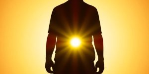Person standing tall with shoulders back, looking forward.